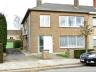 Goed gelegen beleggingeigendom bestaande uit 2 appartementen en 2 garages